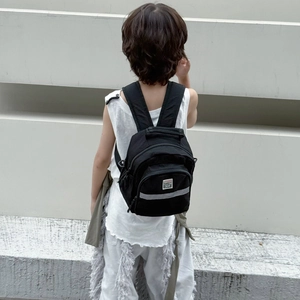 Kids black waterproof backpack with reflective safety strip for boys and girls
