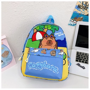 Detailed view of Capybara printed kids backpack with bright blue and yellow color blocking