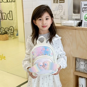 Cute sequin backpack for kids with rainbow wings and a sparkling diamond bow