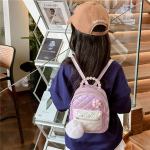 Quilted floral kids backpack in lavender with pearl handle and plush pom charm