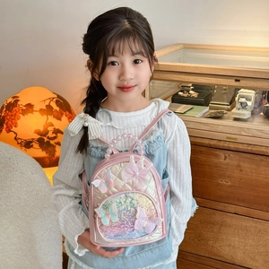 Pink quilted kids backpack with sequins, butterfly appliques and a pearl handle