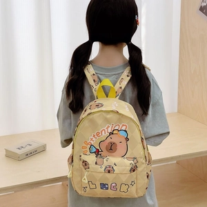 Cute yellow kids backpack featuring cartoon capybara prints and durable nylon fabric