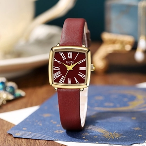 Orologio quadrato dorato rétro da donna con quadrante bordeaux e cinturino rosso