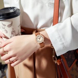 Vintage GEDI women's quartz watch with brown leather strap and beige Arabic numeral dial
