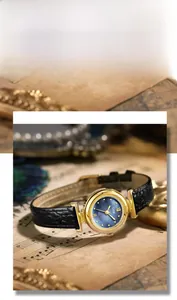 Detail of blue mother-of-pearl watch face with black leather strap on vintage background