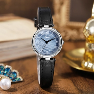 Montre à quartz vintage pour femme avec cadran nacre bleue et bracelet en cuir noir
