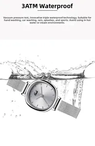 Close-up of 3ATM waterproof silver quartz watch with mesh band submerged in water