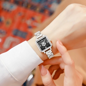 Elegant vintage square watch with silver metal strap and floral relief black dial