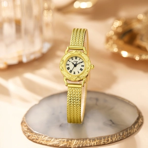 Montre GEDI rétro dorée pour femme avec chiffres romains et bracelet tressé épi