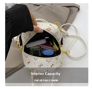 Detailed view of the mini backpack interior capacity showing daily essentials
