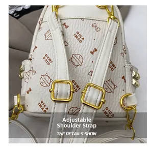 Detailed macro view of adjustable white leather straps and golden metal hardware on backpack