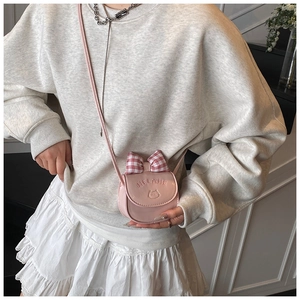 Pink mini crossbody bag featuring a plaid bow, cat embroidery, and long shoulder strap