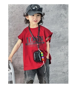 Close-up of black leather mini neck pouch with colorful beads for kids fashion