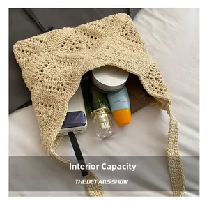 Detail of crochet tote bag interior showing capacity for phone, perfume and cosmetics