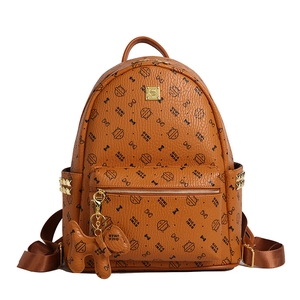 Fashionable brown faux leather backpack with cat patterns and golden zipper detail