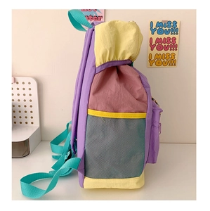 Detailed side view of colorful nylon backpack featuring mesh pockets and vibrant color-blocking