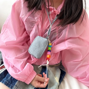 Kids trendy mini neck pouch in light gray fabric with colorful bead charm and lanyard