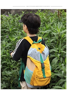 Outdoor leisure backpack detail with nylon texture and vibrant multi-color patchwork
