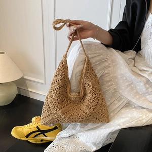 French style crochet tote bag featuring hollow knit design and shoulder strap in khaki color