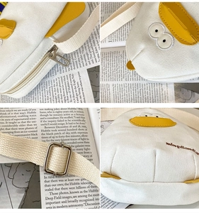 Close-up details of a cute cartoon duck canvas crossbody bag with adjustable strap.