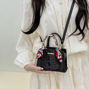 Elegant black stone patterned mini handbag with colorful silk scarf handle and gold hardware