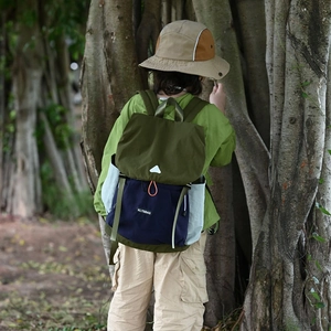 Kids outdoor hiking backpack in green and navy colorblock with large capacity design
