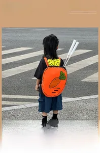 Kid carrot backpack with racket holder shown in use on a street crosswalk