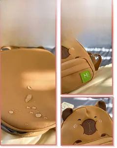 Détails du tissu imperméable et de la broderie du sac à bandoulière Capybara dessin
