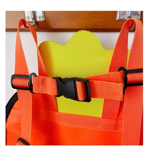 Detail of adjustable nylon straps and black buckle on a carrot-shaped kids backpack