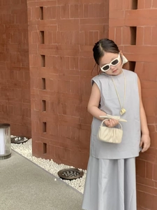 Girl's stylish grey-blue sleeveless top and skirt set with matching cloud handbag