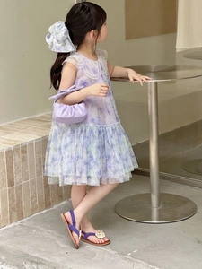 Detail of girls' floral dress set with purple cloud handbag and matching accessories