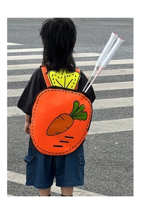 Cartoon carrot backpack for kids with 2D comic style and green leaf details