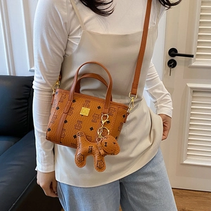 Braune Mini-Bucket-Bag mit Katzen-Print, Handgriff und verstellbarem Schultergurt