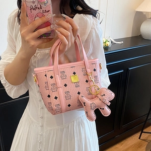 Rosafarbene Bucket Bag aus Leder für Damen mit Katzenmuster und süßem Anhänger
