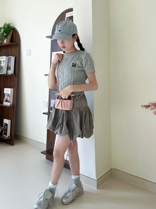 Full set of grey cable knit top, puffy dark skirt, and pink cloud bag for girls
