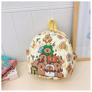 Detail of cute Capybara cartoon backpack for kids with Christmas motifs and lucky prints