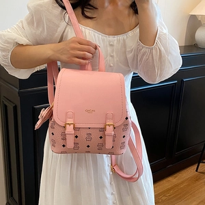 Pink PU leather mini backpack featuring cute cat patterns and adjustable straps