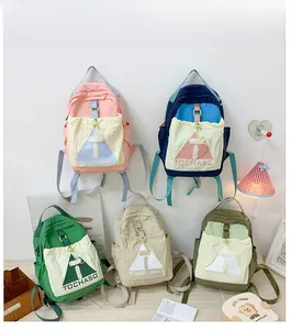 Detailed collection of colorful nylon school backpacks with contrast drawstring pockets