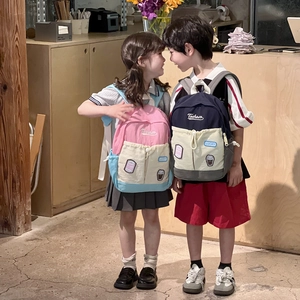 Fashionable color-block school backpack for kids with drawstring and large capacity design