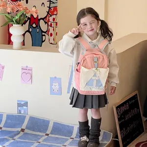 Pink and beige color-block kids backpack with TOCHASD logo for school and travel