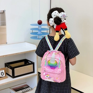 Sparkly pink sequins unicorn backpack for girls with colorful rainbow straps and fur pom