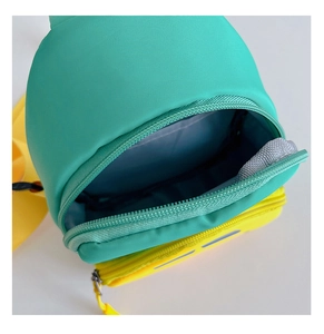 Detailed interior of a cartoon car crossbody bag showing teal and yellow contrast