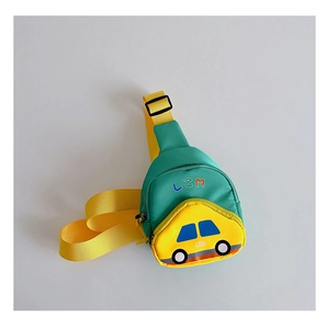 Detail of cartoon car chest bag in green and yellow with adjustable nylon shoulder strap