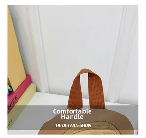 Close-up of durable nylon handle and smooth metal zipper on children's backpack