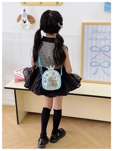 Cute light blue round crossbody bag for children featuring cartoon bear and cake prints
