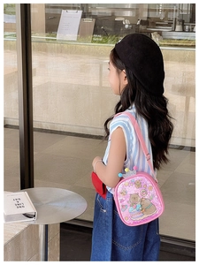 Pink kids crossbody bag featuring sparkly sequins and cute cartoon illustrations with a crown