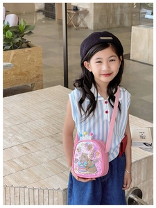 Pink sequin crossbody bag for kids featuring cartoon bear and glitter crown detail