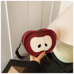 Mini apple shaped crossbody bag with red and white PU leather and adjustable brown strap