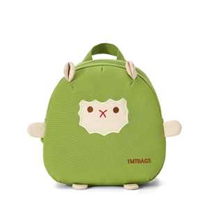 Détail du sac à dos mouton vert montrant la broderie animale et la texture en toile durable