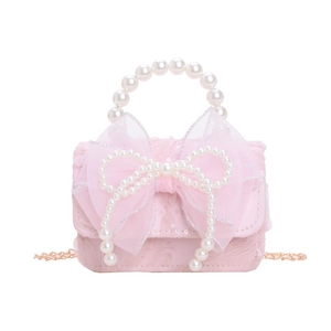 Pink lace mini handbag for girls featuring a large bow, pearl handle and gold chain strap